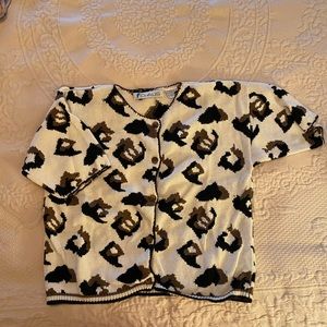 Bold cheetah print short sleeve, button front, sweater. Fun & flirty. Chaus.
